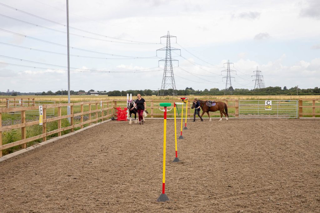 Image of our volunteers getting ready for the riding session