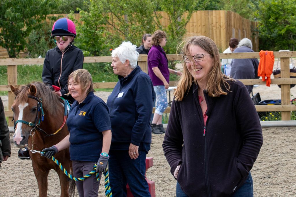 Image of an instructor supervising the riding session